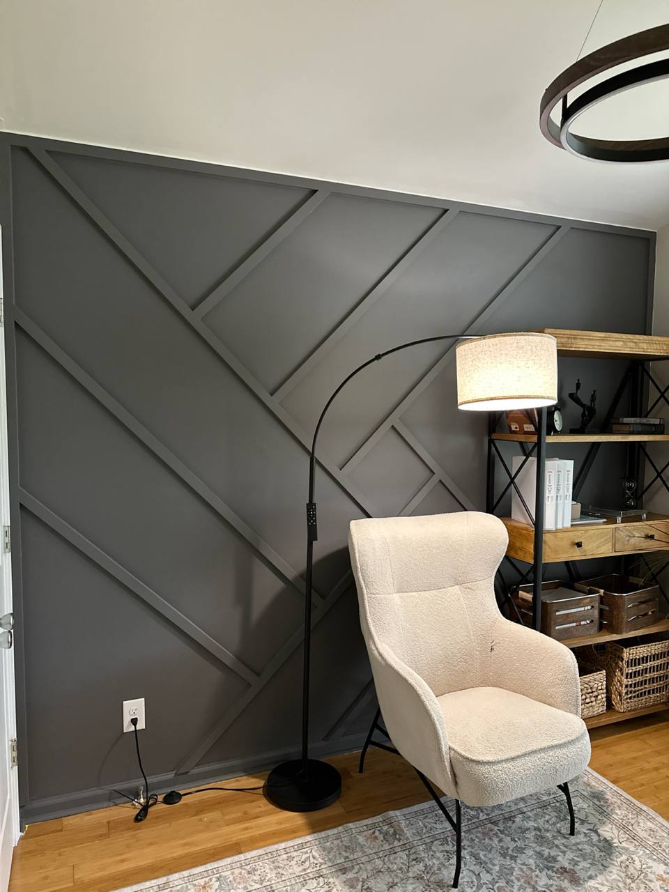 Gray geometric diagonal accent wall in modern living room